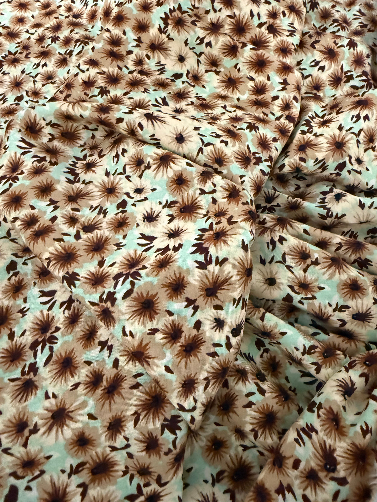 Chocolate Daisy on Mint Viscose Dress Fabric | Sold by the Metre
