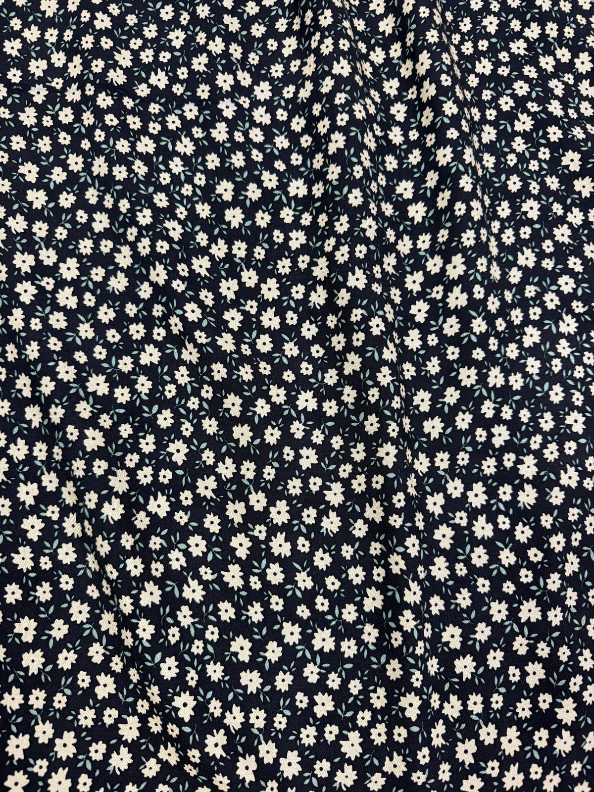 Cream Daisy on Black Viscose Dress Fabric | Sold by the Metre