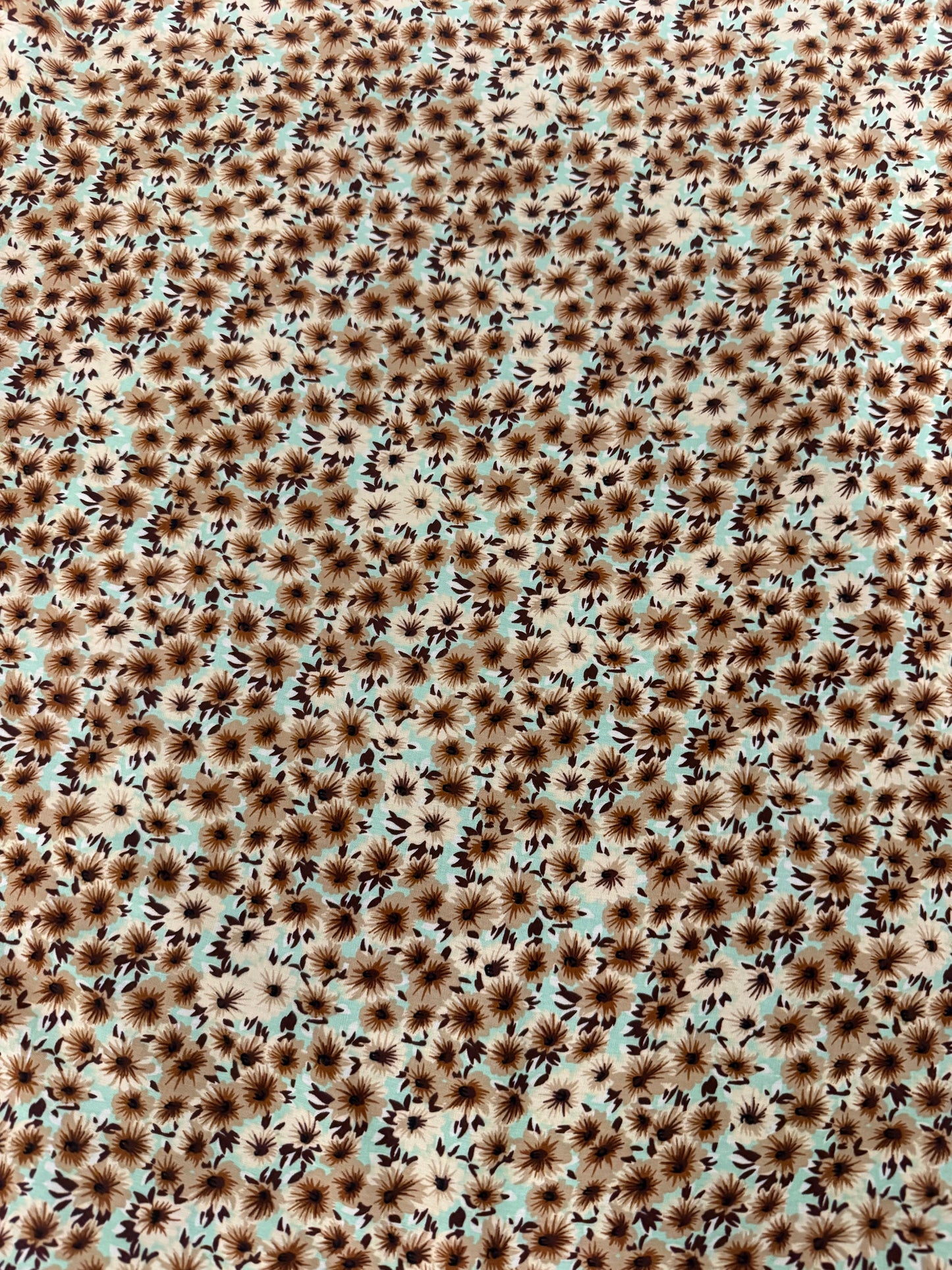Chocolate Daisy on Mint Viscose Dress Fabric | Sold by the Metre