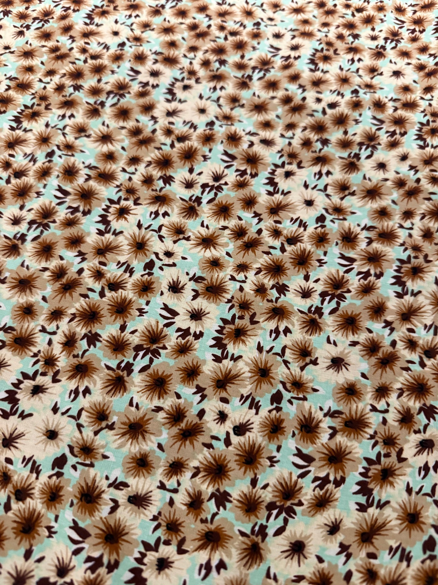 Chocolate Daisy on Mint Viscose Dress Fabric | Sold by the Metre