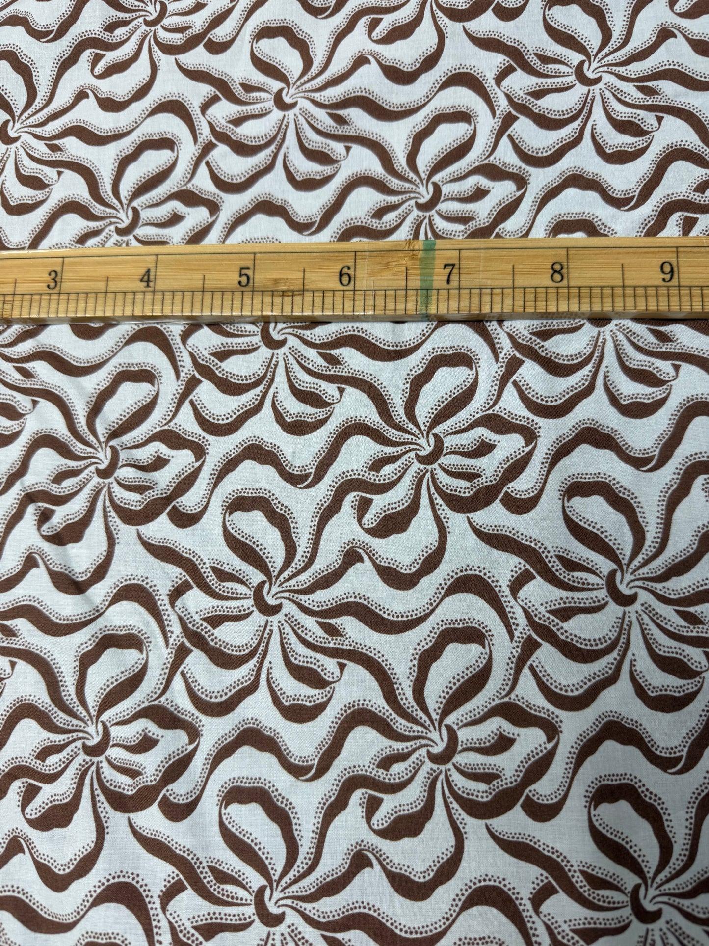 Chocolate Retro Swirl Cotton Dress Fabric | Sold by the Metre