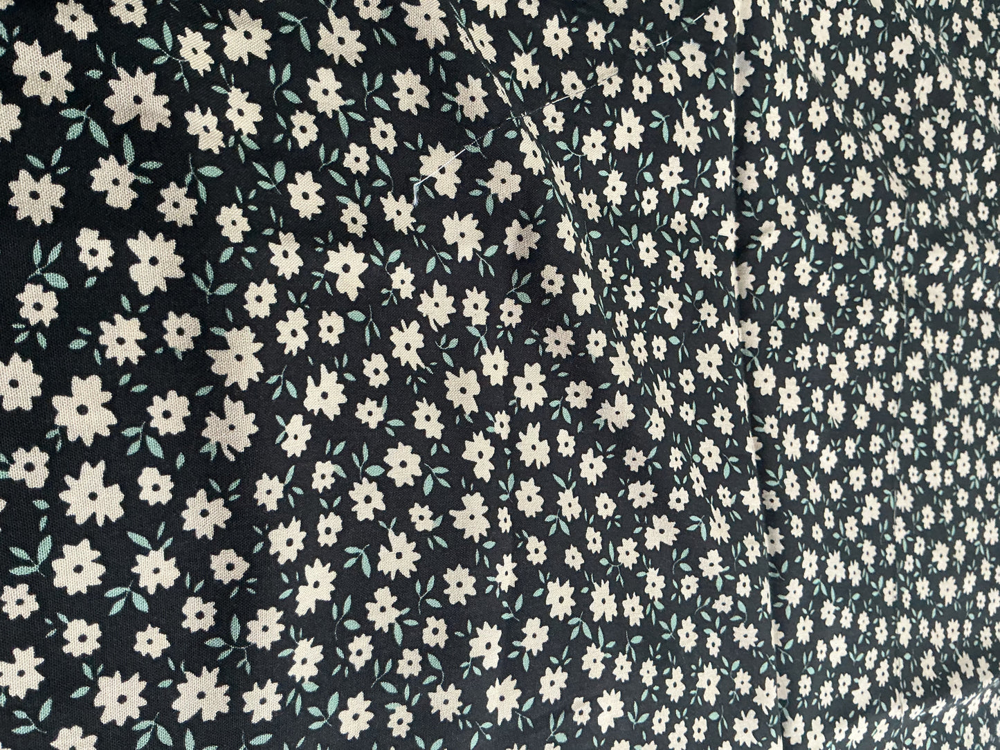 Cream Daisy on Black Viscose Dress Fabric | Sold by the Metre