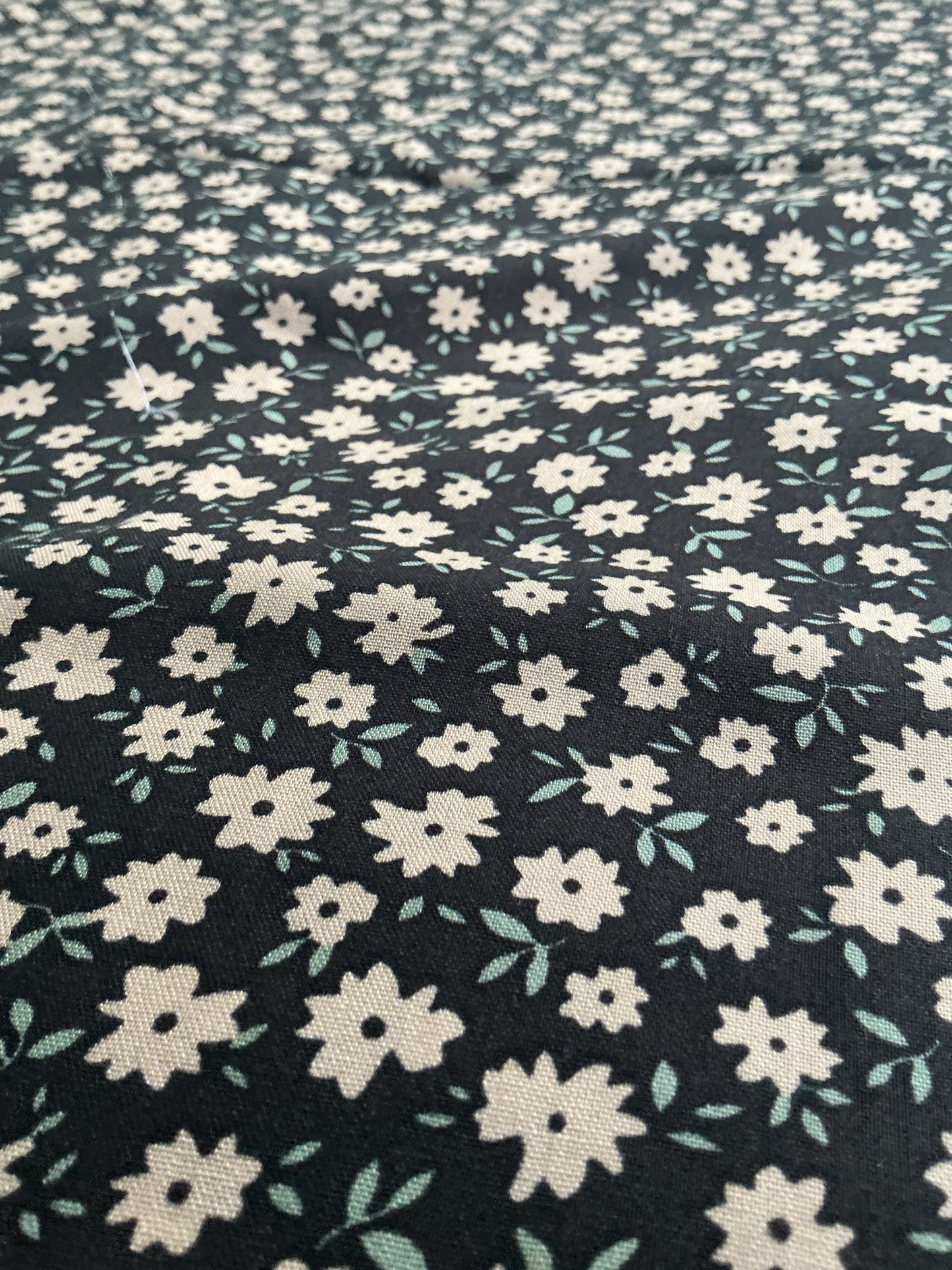 Cream Daisy on Black Viscose Dress Fabric | Sold by the Metre